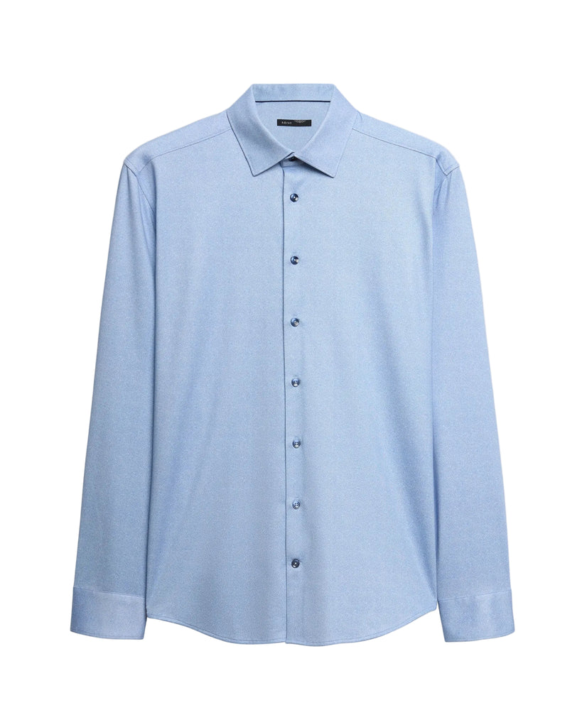 A light blue long-sleeve button-down shirt with a classic collar and button-down front, displayed on a neutral light gray background.